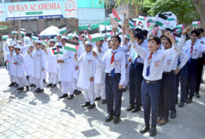 Students of the Quran Academy staged a protest to express solidarity with the Palestinian people, condemning the actions of Israel.