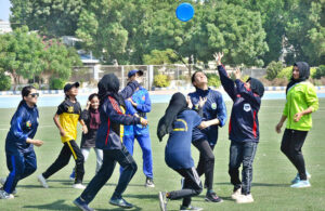 Players in action in Flying Disc match between ITS Academy & Baloch Academy teams during Hyderabad Flying Disc Championship at Public School