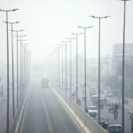 A view of vehicles on the way during smog in the city