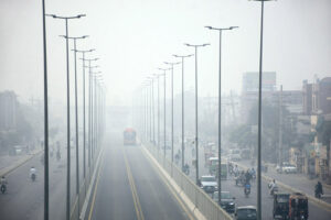 A view of vehicles on the way during smog in the city