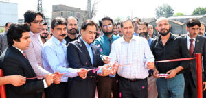Speaker National Assembly Sardar Ayaz Sadiq in a group photo with MNA Isphanyar M. Bhandara along with staff members.