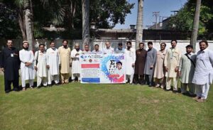 Doctors examining patients during free eye camp organized by Peshawar Press Club for journalists' families at Press Club.
