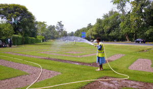 Dedicated gardeners work tirelessly to maintain the lush greenbelt along the canal to enhance the beauty of the city.