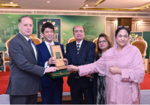 Deputy Head of Malaysian High Commission Mohammad Sayafik Firdaus giving away "Leaders in Sustainability Awards" to the sustainable development champions, organized by Devcom-Pakistan
