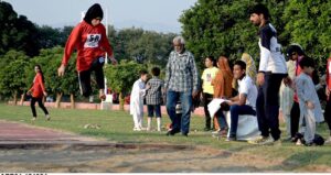A student in action during the 3-day 'Girls Sports Carnival 2024,' organized by the Ministry of Federal Education and Professional Training at Pakistan Sports Complex.