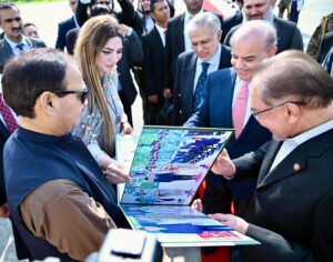 Prime Minister of Malaysia Dato' Seri Anwar Ibrahim is being presented an album comprising photographs of his three-day visit of Pakistan.