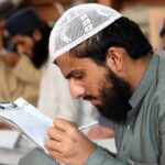 Madrassa students are busy giving annual exam at Jamia Ishatul Quran Wal Hadith Dodai Road in the City