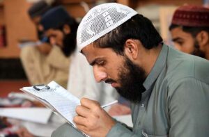 Madrassa students are busy giving annual exam at Jamia Ishatul Quran Wal Hadith Dodai Road in the City