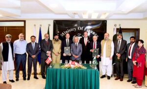 Federal Minister for Maritime Affairs Qaiser Ahmed Sheikh is signing MOU with Danish Government in the presence of Finance Minister Muhammad Aurangzeb, Commerce Minister Jam Kamal and Minister for Industries Rana Tanveer Hussain.