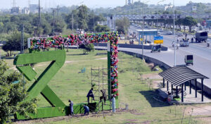 CDA gardeners beautified green blet at Taramri Chowk with beautiful artificial flowers and fancy lights in preparation for upcoming the 23rd Shanghai Cooperation Organization (SCO) summit in the Federal Capital.