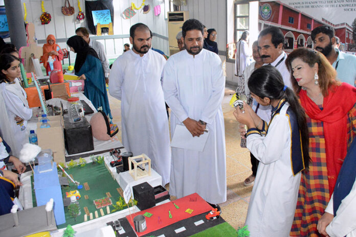 Students present scientific models during the Science and Art Exhibition at La Salle Higher Secondary School