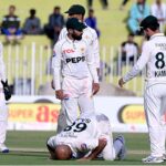 Pakistan's Sajid Khan bows his head in gratitude to Allah at Pindi Cricket Stadium, celebrating his fifth wicket on day one of the third Test match against England