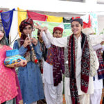 Students are performing during a function at Govt Girls High School Little Folks Jinnah Bagh
