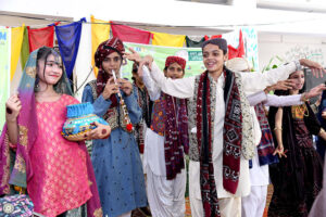 Students are performing during a function at Govt Girls High School Little Folks Jinnah Bagh