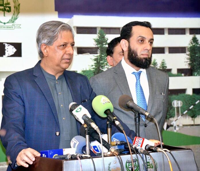 Federal Minister for Law and Justice Senator Azam Nazeer Tarar and Federal Minister for Information and Broadcasting Ataullah Tarar holding a joint Media talk