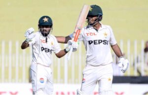 Pakistan player Saud Shakeel celebrates after scoring a century (100 runs) during the second day and last cricket Test match between Pakistan and England Pindi Cricket Stadium in twin cities
