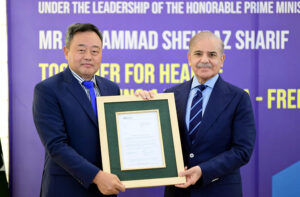 The Head of Mission of World Health Organisation in Pakistan Dr. Lou Dapeng presenting a certificate of elimination of TRACHOMA as a public health problem from Pakistan to Prime Minister Muhammad Shehbaz Sharif.