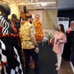 Visitors explore stalls at TEXPO 2024, showcasing the best in textiles and leather at Expo Centre