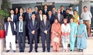 Secretary Benazir Income Support Programme (BISP), Amer Ali Ahmad, briefs the delegation of officers from the 36th Senior Management Course (SMC) of the National Institute of Management (NIM), on BISP initiatives.