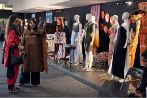 Visitors explore stalls at TEXPO 2024, showcasing the best in textiles and leather at Expo Centre