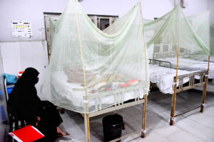Dengue patients receive treatment in a ward at Bhitai Hospital as the Pakistan Meteorological Department warns of a 'critical' two weeks ahead due to a surge in infections across the country