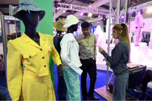 Visitors explore stalls at TEXPO 2024, showcasing the best in textiles and leather at Expo Centre