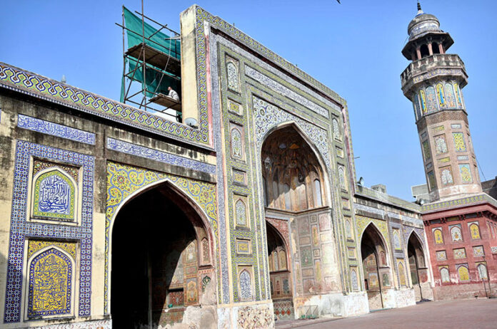 Labourers busy in renovation work to the historical Mosque Masjid Wazir Khan at Walled city. The Wazir Khan Mosque is 17th century. The mosque was commissioned during the reign of the Mughal Emperor Shah Jahan as part of an ensemble of buildings that also included the nearby Shahi Hammam baths. Construction of Wazir Khan Mosque began in 1634 C.E. and completed in 1641
