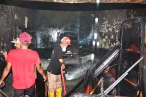 Firefighters battle to extinguish a blaze that erupted in a house on Hali Road