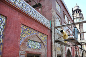 Labourers busy in renovation work to the historical Mosque Masjid Wazir Khan at Walled city. The Wazir Khan Mosque is 17th century. The mosque was commissioned during the reign of the Mughal Emperor Shah Jahan as part of an ensemble of buildings that also included the nearby Shahi Hammam baths. Construction of Wazir Khan Mosque began in 1634 C.E. and completed in 1641