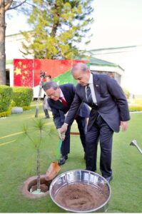 Chinese Premier, Li Qiang planting a sapling at Prime Minister's House.