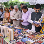 Chairman PEMRA Muhammad Salim Baig visiting the stall during the book fair at the Press Club
