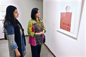 Art enthusiasts keenly observing the collaborative exhibition titled “Diptych” by artists Sarah Hopkins and Muhammad Atif Khan at Tanzara Gallery Saidpur Village in the Federal Capital.