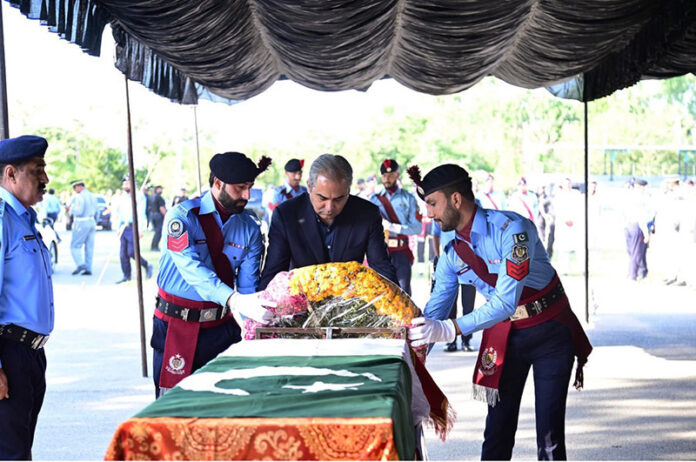 Federal Minister for Interior Mohsin Naqvi offering the funeral prayer of martyr Sub-Inspector Haider Ali Shah at Police Lines