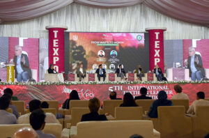 CEO Pakistan Textile Council, Sheikh Muhammad Iqbal speaks during the Seminar from Waste to Worth Curricular Innovations in Pakistan second day of the 5th International Textile and Leather Exhibition TEXPO 2024. Mr. Boudewijn Mol Director M/S Bedding House, Mr Usman Khan Investment Trade and Climate Finance Advisor REMIT and others also seen on the stage