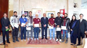 Ambassador of Pakistan to Turkiye, Dr. Yousaf Junaid in a group photograph with motorcyclists from Cross Route Club Pakistan