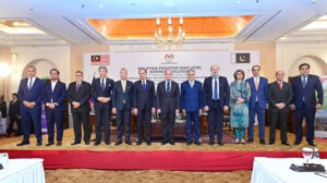 Prime Minister Muhammad Shehbaz Sharif and Prime Minister of Malaysia YAB Dato' Seri Anwar Ibrahim in a group photo at Malaysia -Pakistan High Level Business Dialogue.