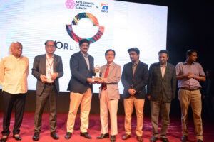 The Chief Minister Syed Murad Ali Shah giving away award to a diplomat during the award distribution ceremony under the World Culture Festival Karachi at Arts Council of Pakistan