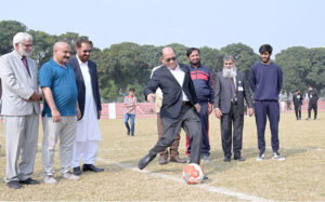 High Commission Malaysia Azhar Bin Mazlan kicks the ball to inaugurate Shaheen Sports League Organised by Al Khidmat Foundation on Iqbal Day at Sports Complex