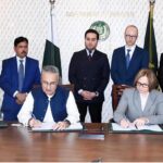 Secretary Economic Affairs Dr. Kazim Niaz and Director of the German Development Bank (KFW)Esther Gravenkotter signing the second phase of Billion Tree Afforestation project