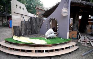 Workers are busy in installation a model of the provincial major cities for the upcoming Folk Festival "Lok Mela 2024" at Lok Versa in the Federal Capital.