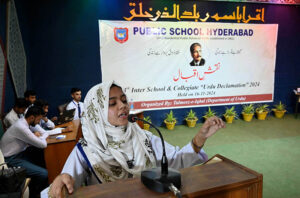 Students performing tableau during 3rd competition of Speeches organized by Urdu department at Public School