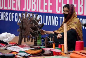 An artist meticulously creates detailed models and miniature ships, turning craftsmanship into art for selling at the 10-day 'Lok Mela,' celebrating provincial culture and folk heritage in the federal capital.