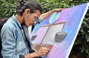 Students participating in Art Work Competition organised by The Knowledge of Art Academy in collaboration with The Book Studio, NCBA University, University of Education and Birmingham University UK at University of Education Township Lahore.