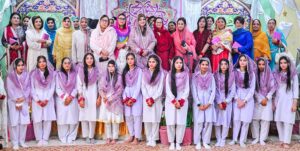 A group photo of MNA Tahira Aurangzeb , MPA Shazia Rizwan, MPA Riffat Abbass, Principal Dr. Nighat with participants at the conclusion of the Mehfil-e-Milad at Government College Dhoke Elahi Baksh in the twin cities.