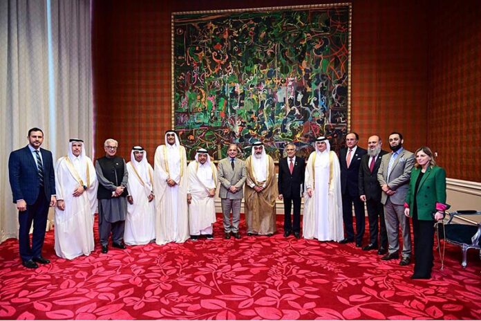 Prime Minister Muhammad Shehbaz Sharif in a group photo with a delegation of Qatar Businessmen Association