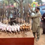 People visiting food stall during ten days “Folk Festival Lok Mela” at Lok Virsa in the Federal Capital