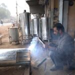 A worker busy in making geyser at selawli road