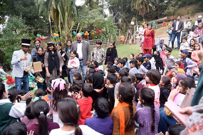 Magicians perform their tricks at children's fair on Shimla Hill Press Club