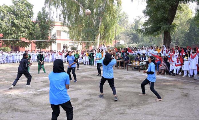Players in action during Volley ball match played between Govt Girls College Farooq Colony and Govt Girls College Chandni chowk During Intercollegiate Girls Volley ball tournament at Government Graduate College for Girls, Chandni Chowk