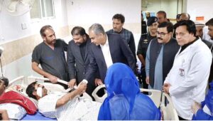 Federal Minister for Interior Mohsin Naqvi along with CM Balochistan Sarfraz Bugti inquiring about the health of the injured person in Railway Station blast at Civil Hospital
